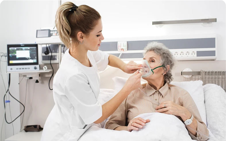Healthcare professional caring for elderly woman